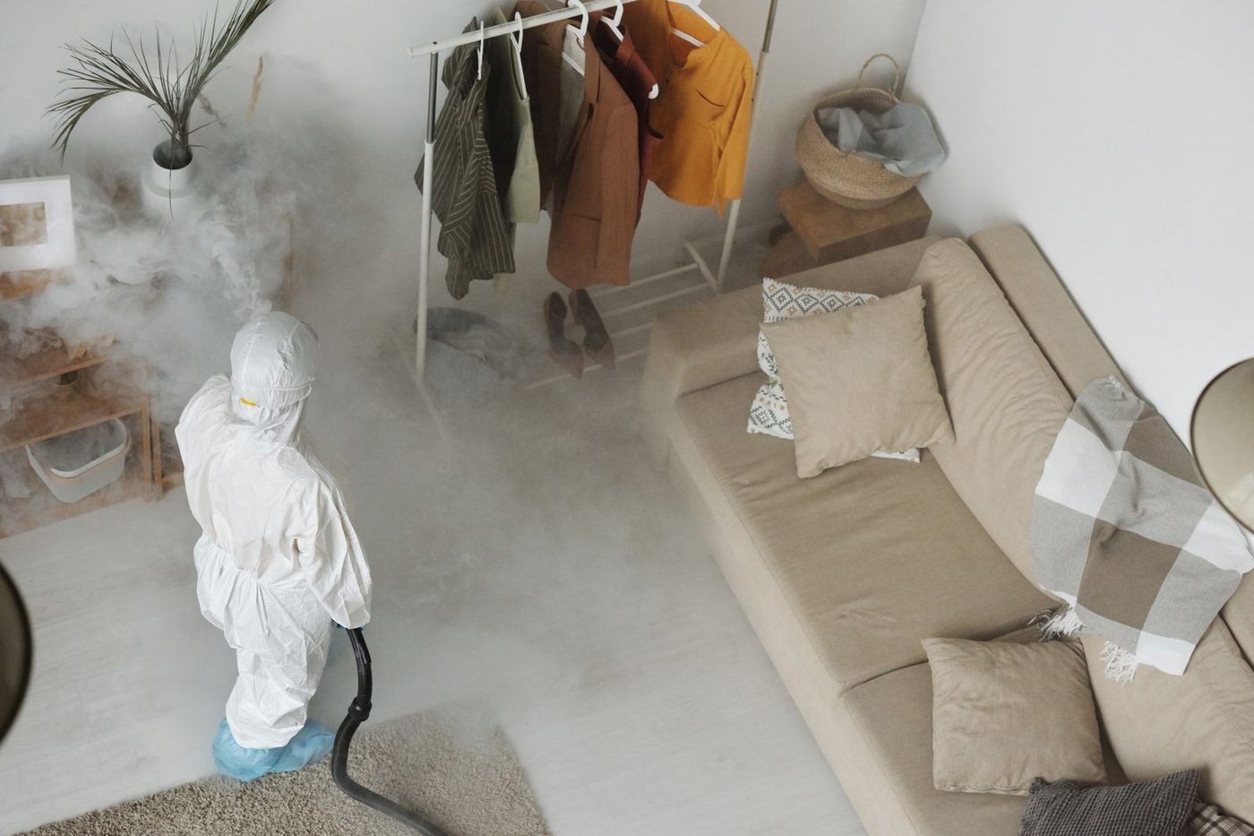 Cockroach treatment being applied inside a Phoenix home